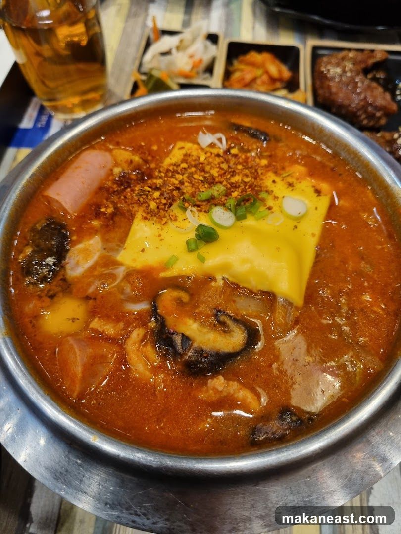 Spicy Stew with Cheese and Toppings