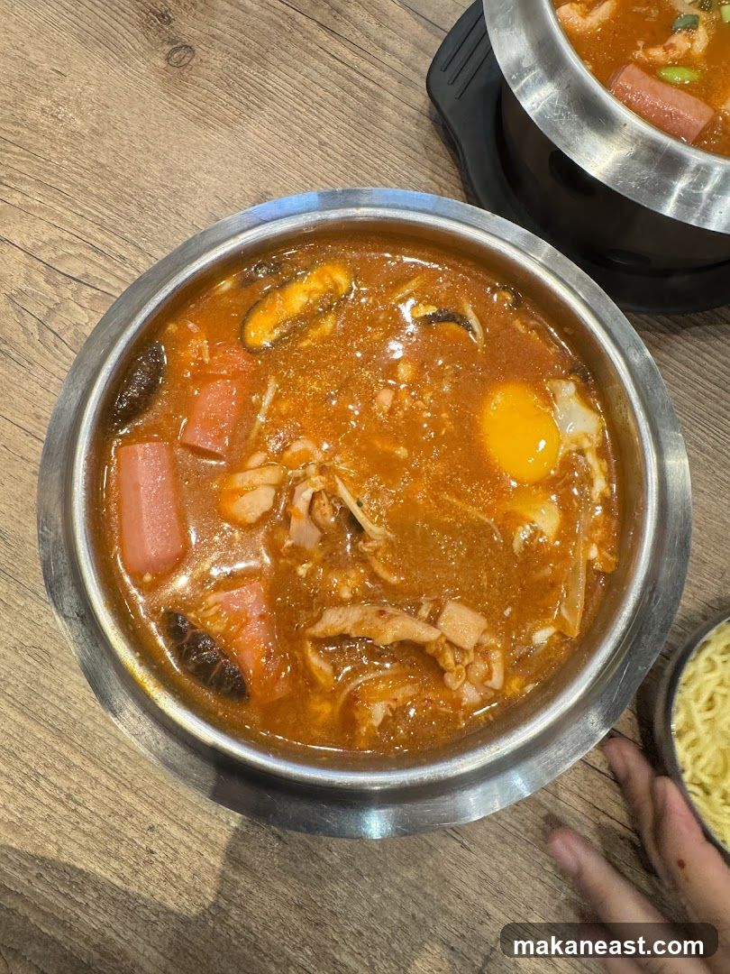 Spicy Stew with Egg and Sausage