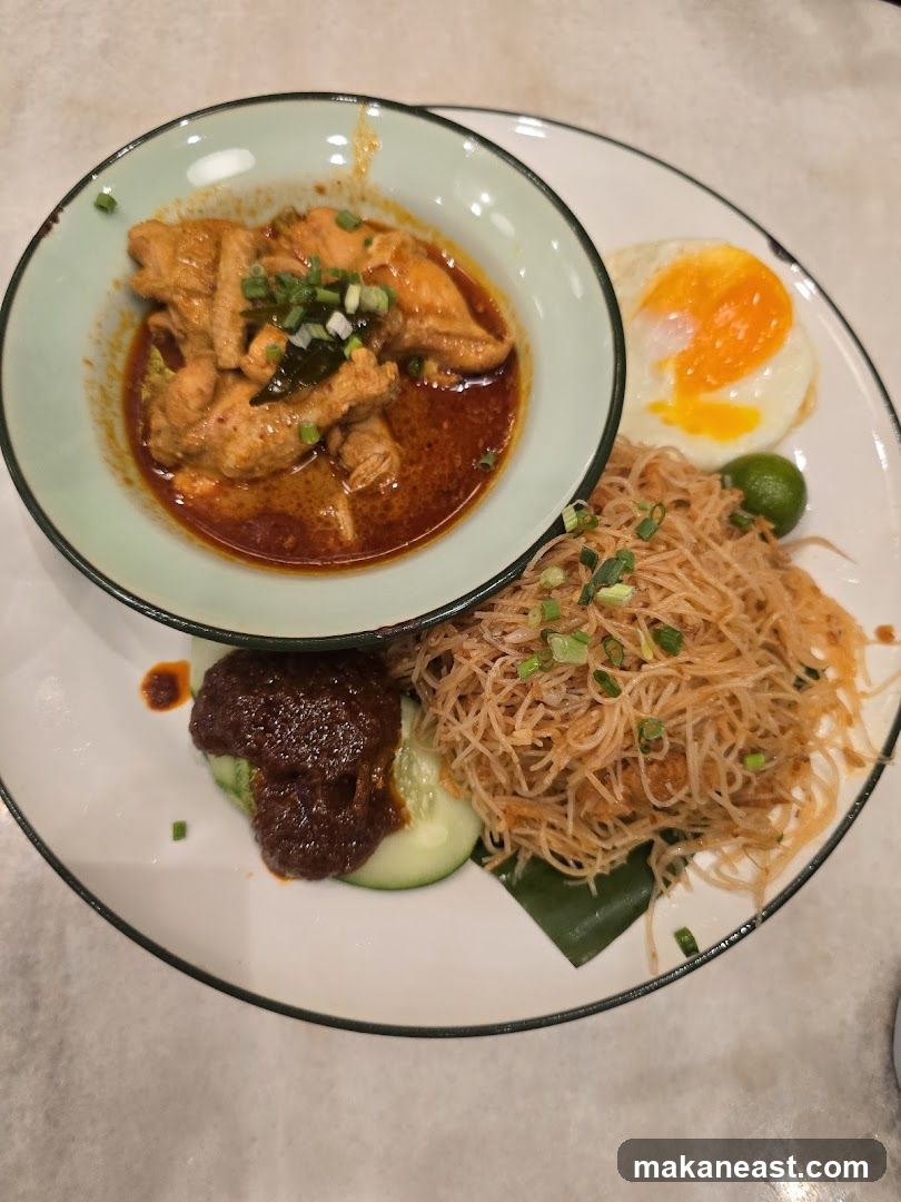 Chicken Curry with Noodles and Fried Egg