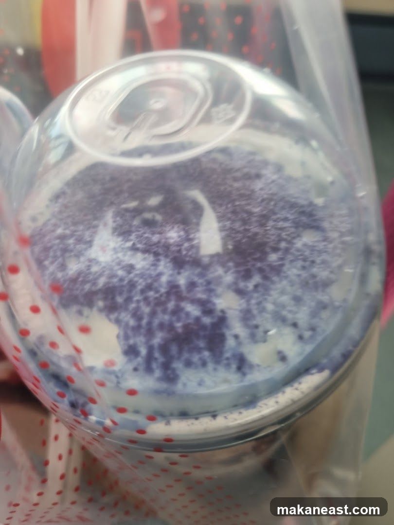 Purple Drink in Plastic Cup