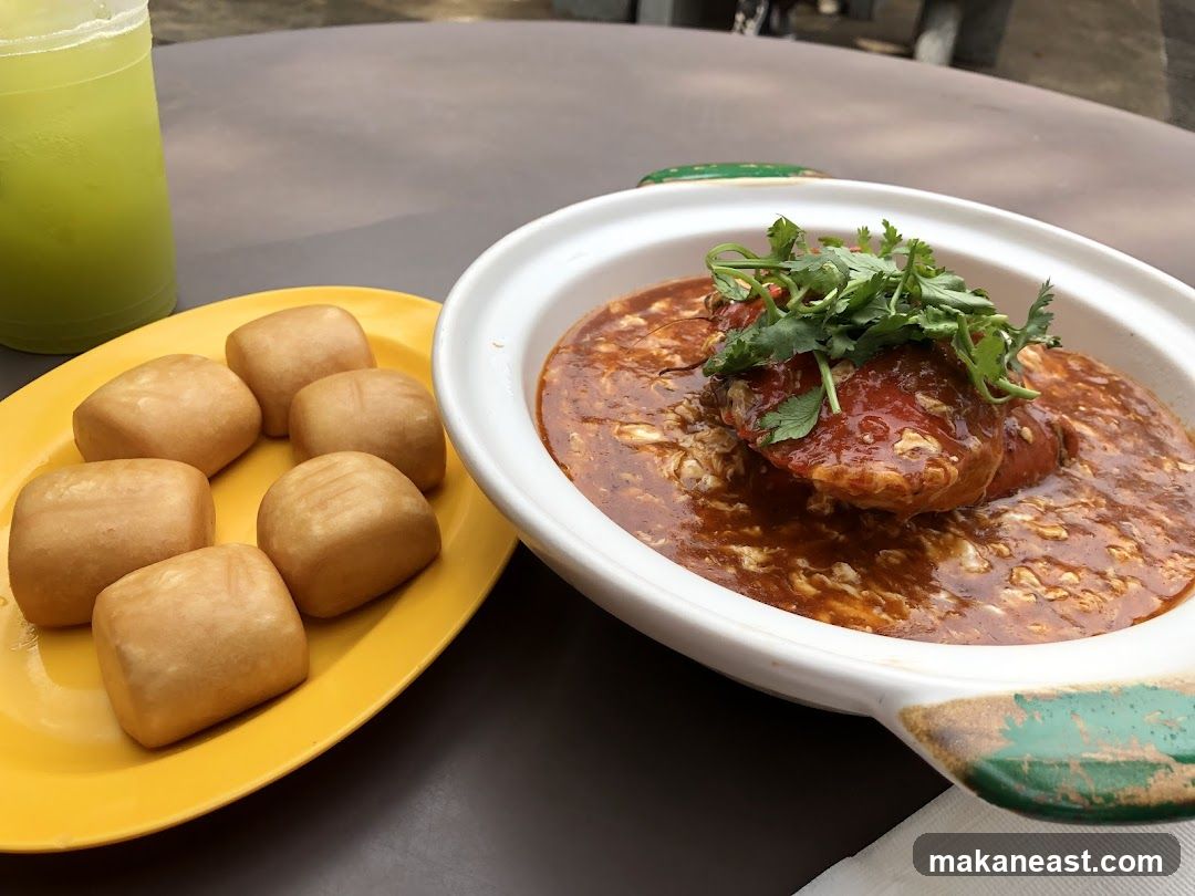 Crab dish with fried buns and drink