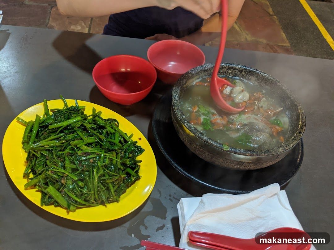 Steaming Soup and Stir-Fried Vegetables