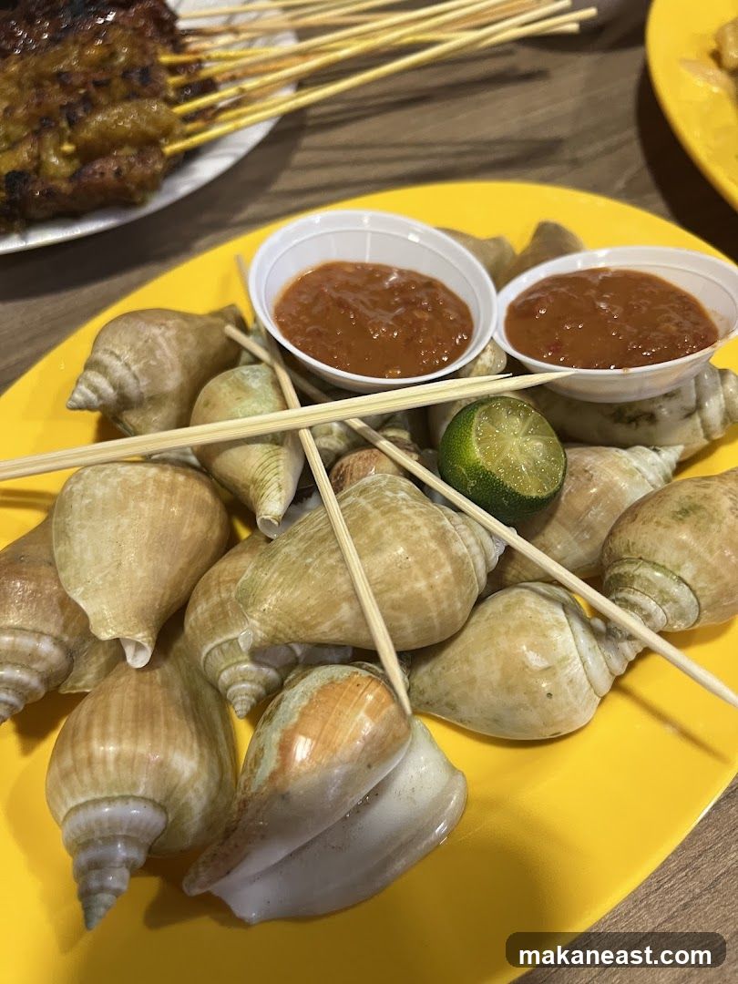 Seafood dish with dipping sauce