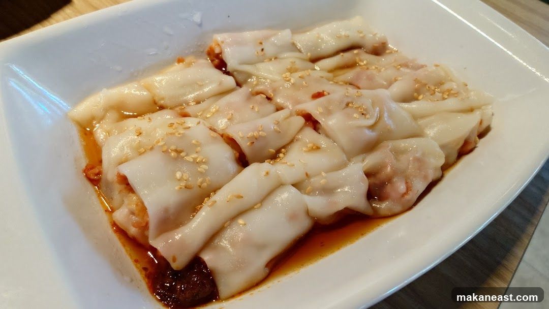 Steamed Rice Rolls with Sesame Seeds