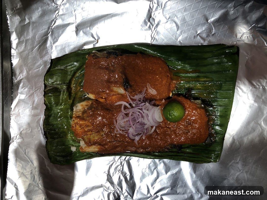 Fish dish with sauce and lime