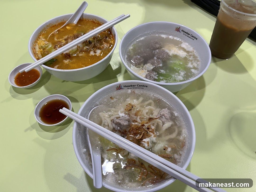 Three bowls of noodles and a drink