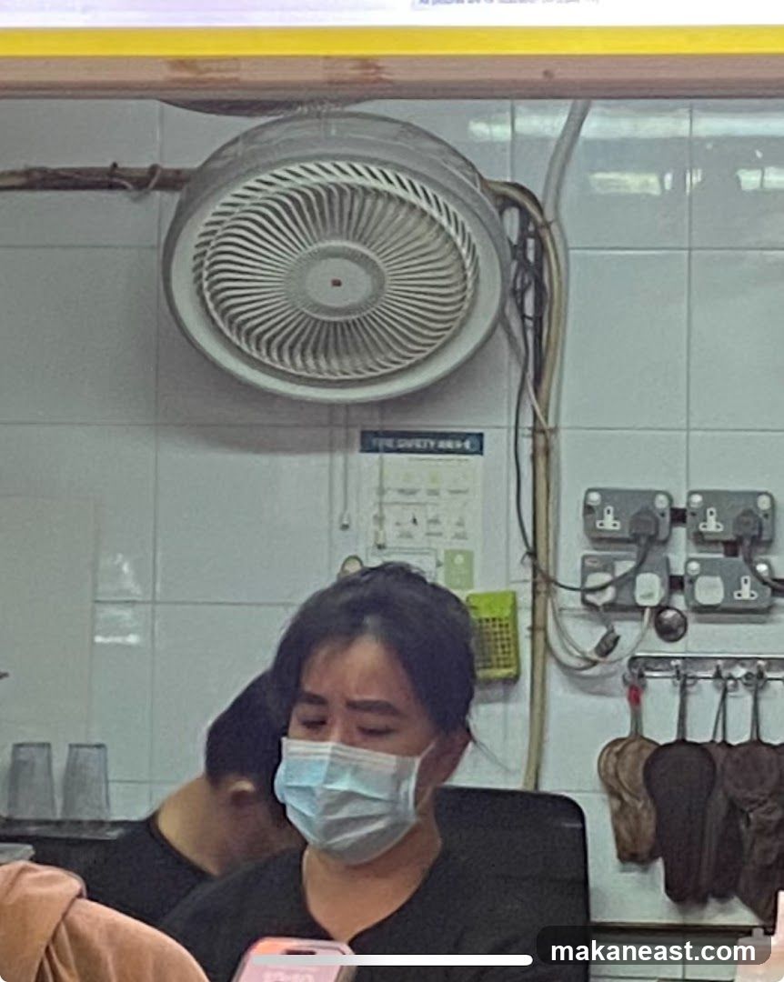 Staff member at a counter