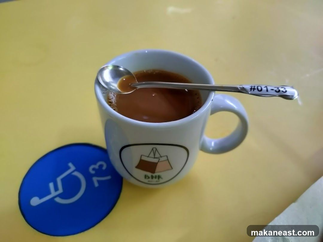 Coffee with Spoon and Coaster