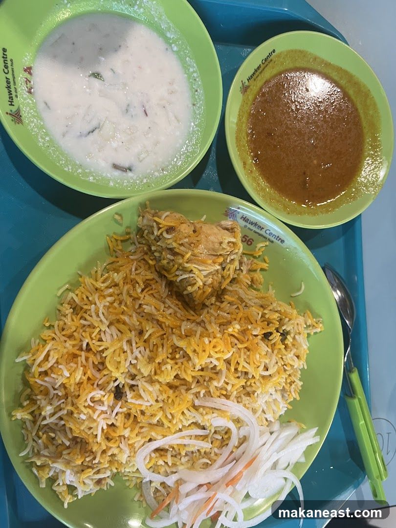 Chicken Biryani with Raita and Curry