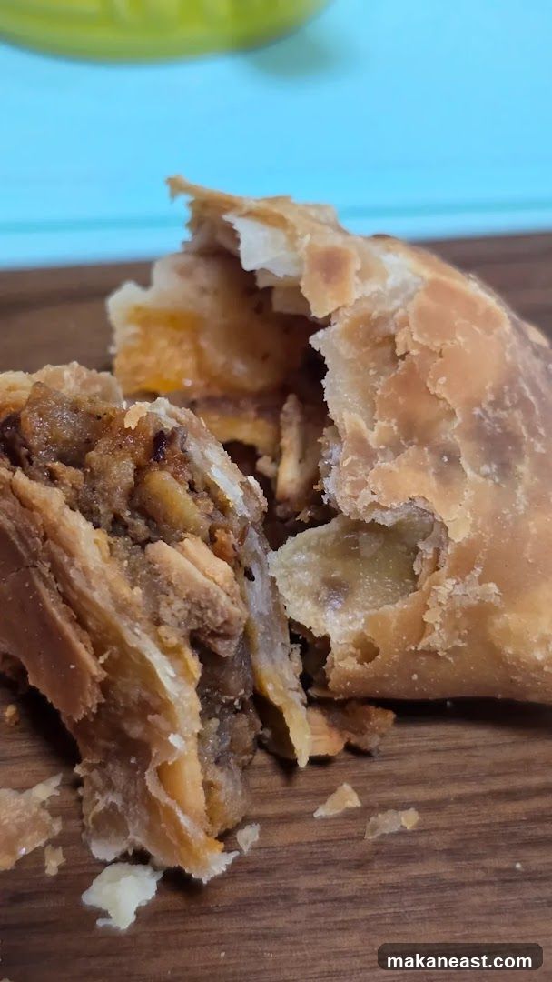 Close-up of a broken pastry with filling