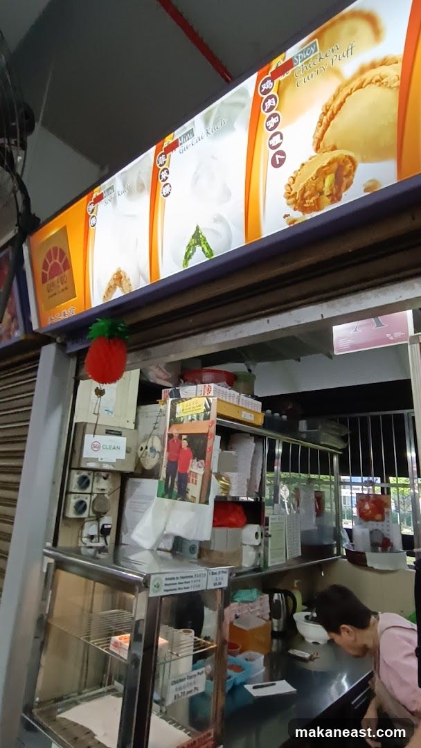 Food stall display with menu and food items