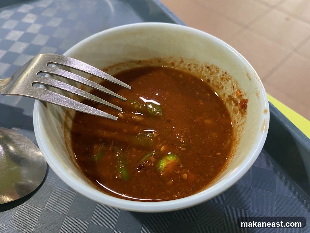 Bowl of Sauce with Fork