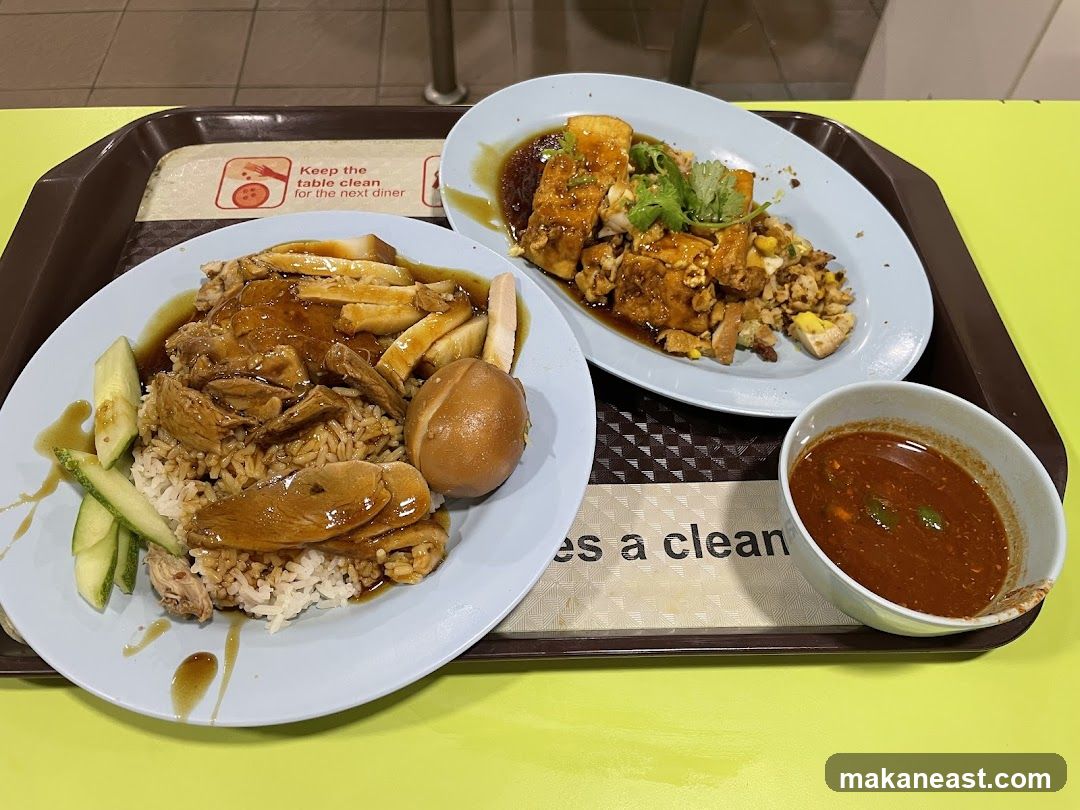 Two plates of food with dipping sauce