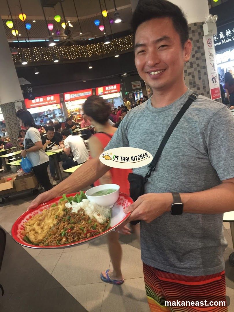 Man holding a plate of food