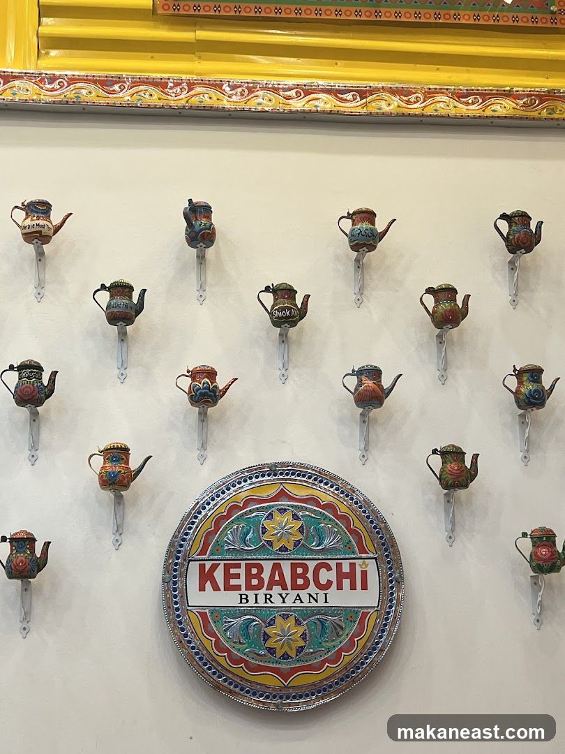 Kebabchi Biryani Sign with Teapots