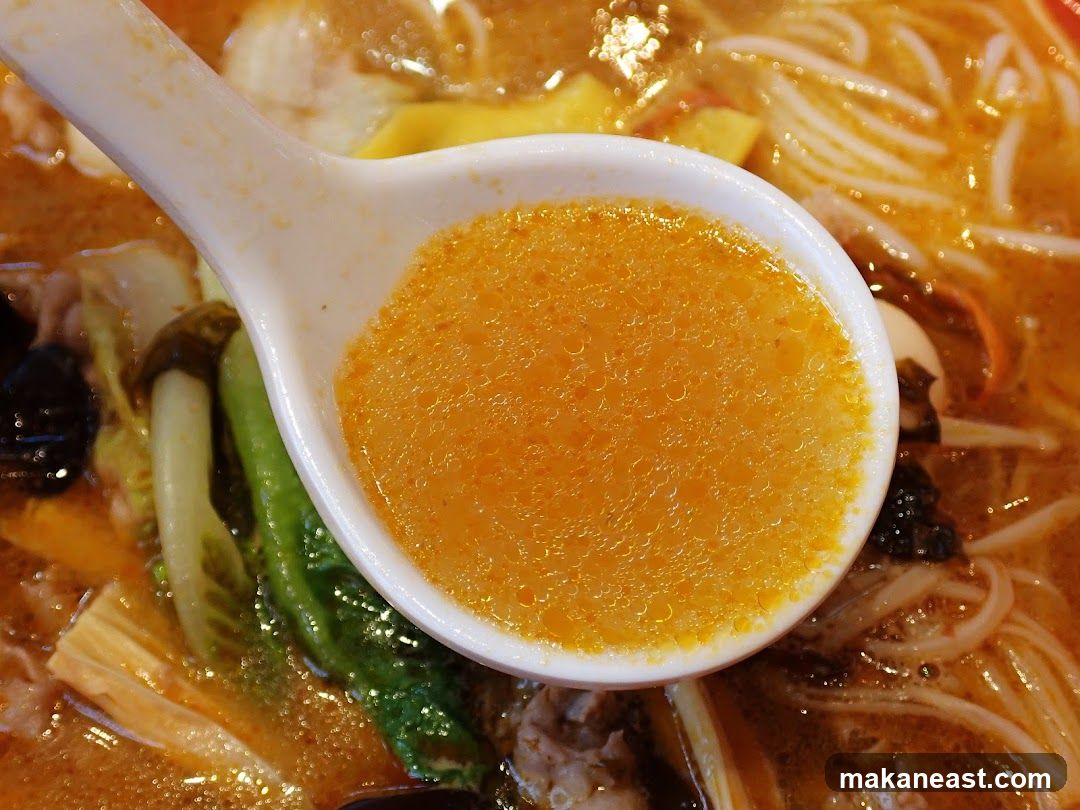 Close-up of a Spoonful of Noodle Soup