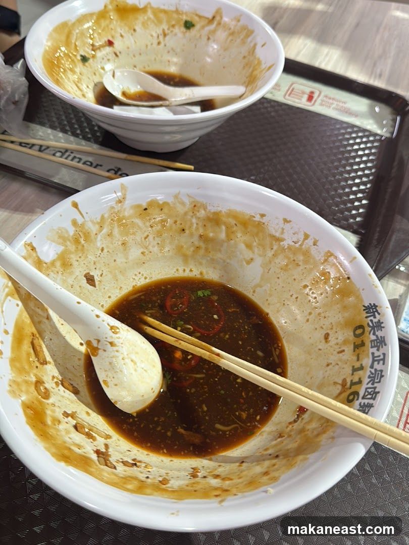Dirty Bowls with Chopsticks and Spoon