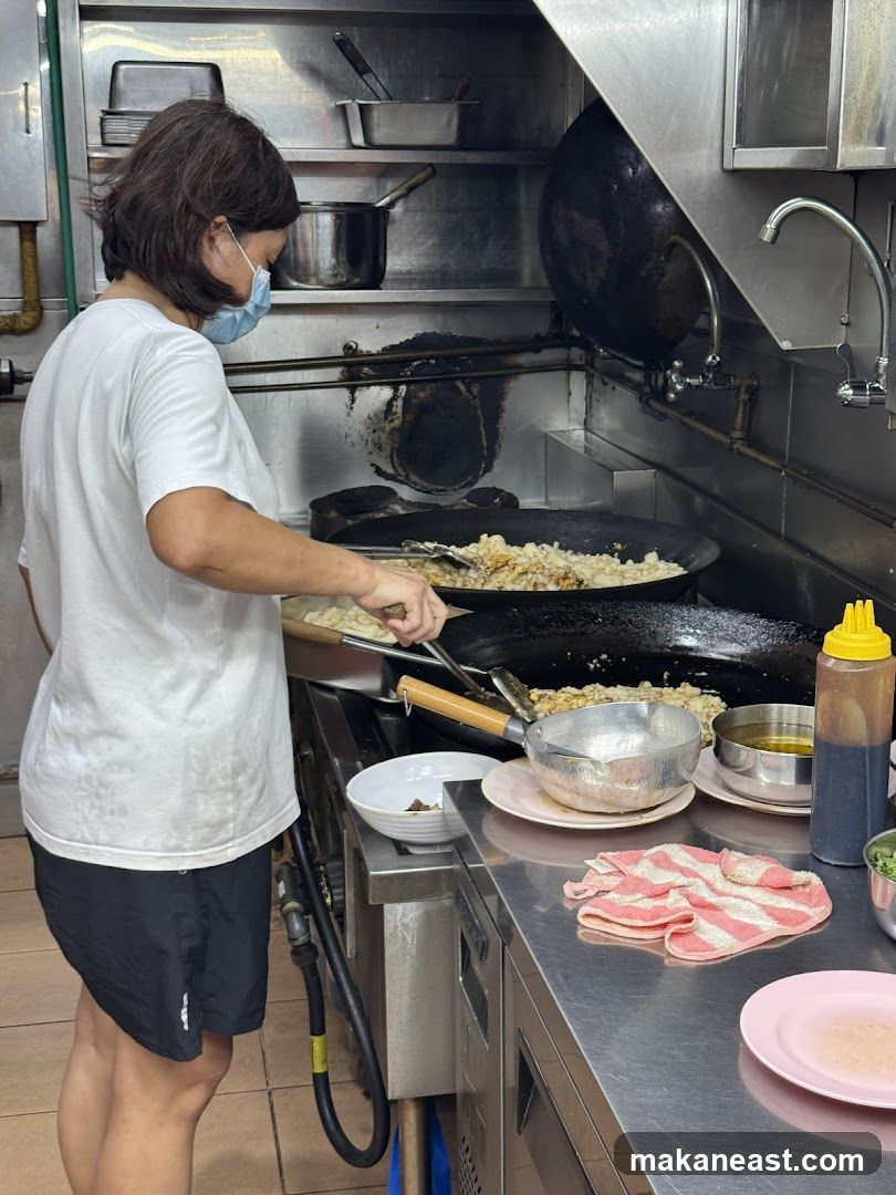 Cook preparing food in a commercial kitchen