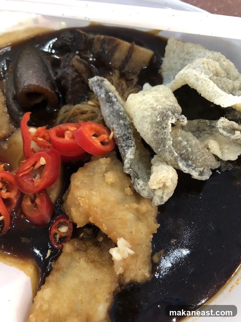 Fish and Chips with Dark Sauce