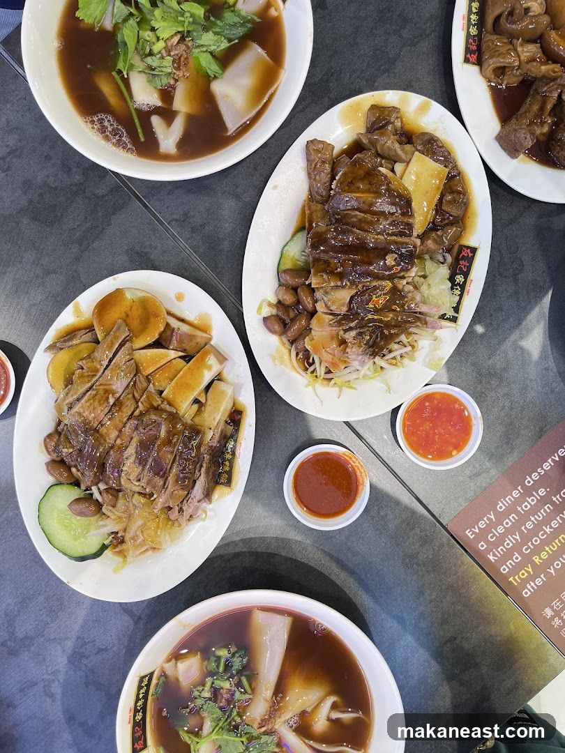 Plates of Braised Duck and Noodles