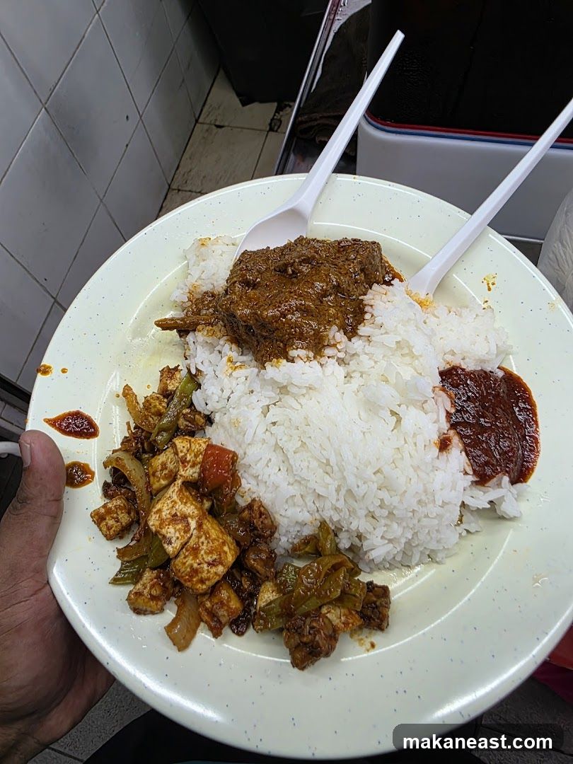 Plate of Rice with Meat and Vegetables