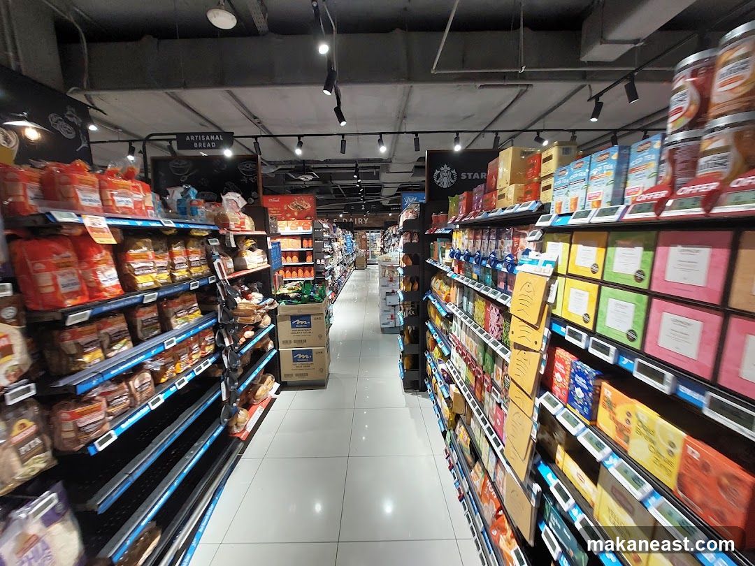 Supermarket aisle with bread and tea