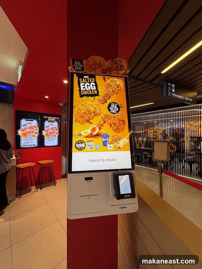 Self-order kiosk with Salted Egg Chicken promotion