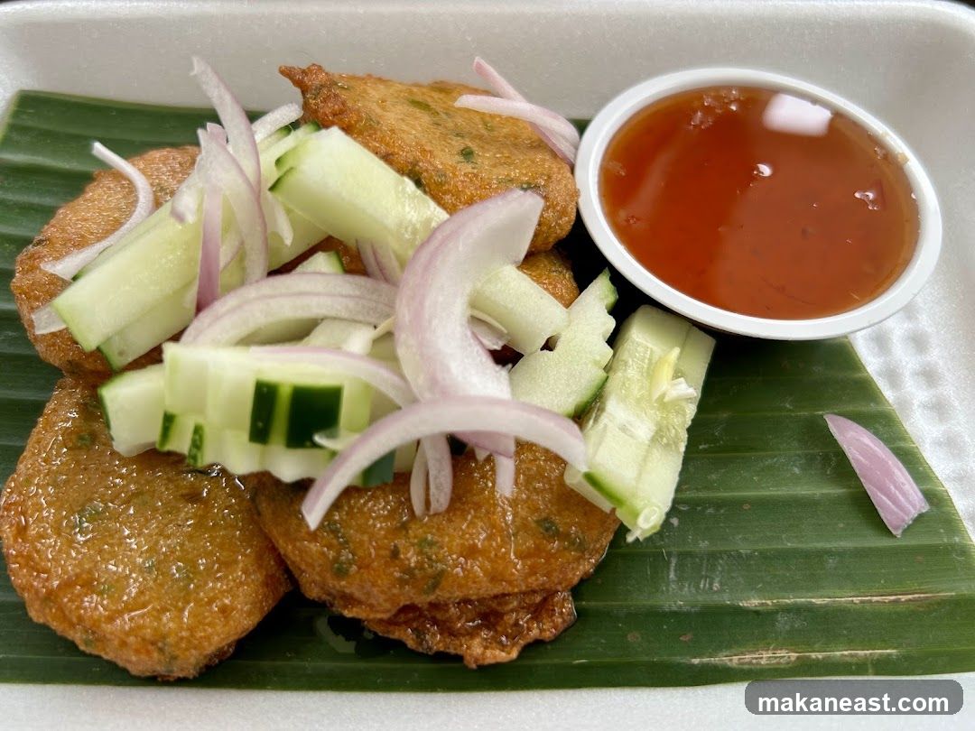 Fish cakes with cucumber and onion