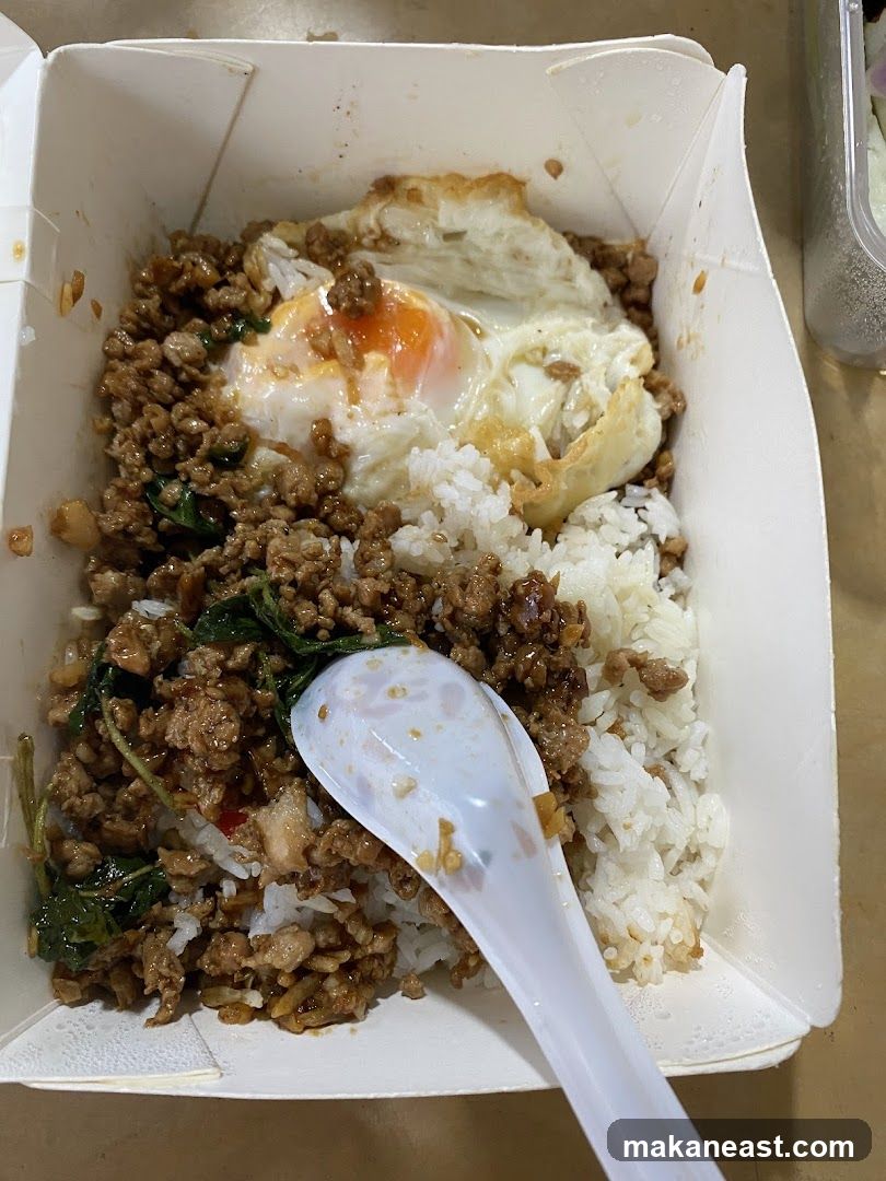 Minced Pork with Basil and Fried Egg over Rice