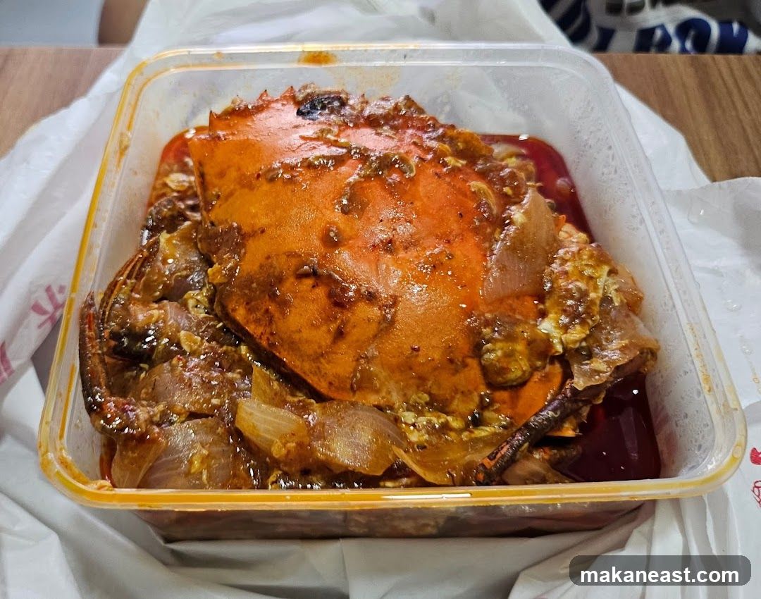 Crab dish in takeout container