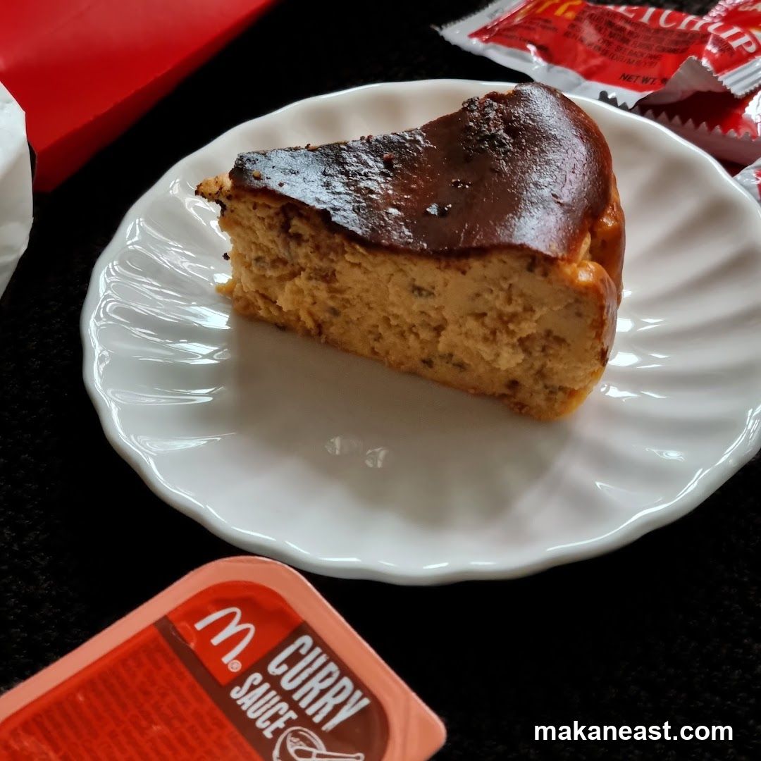 Slice of cheesecake with curry sauce