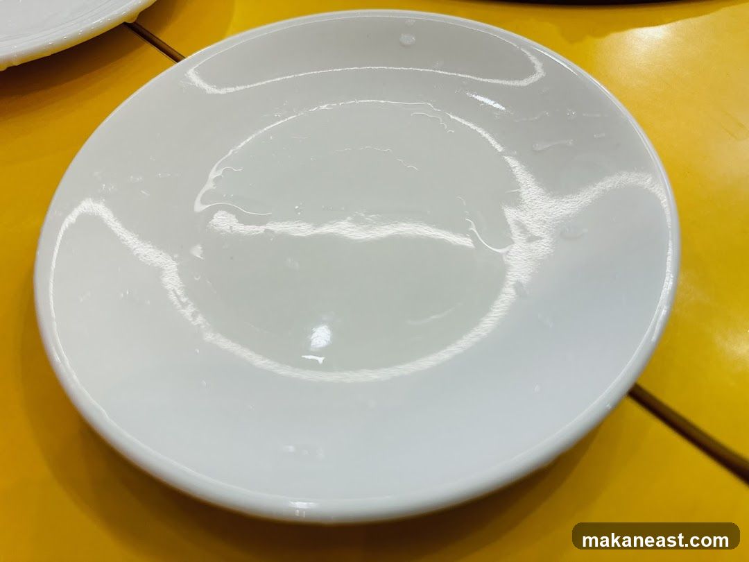 White Plate on Yellow Surface