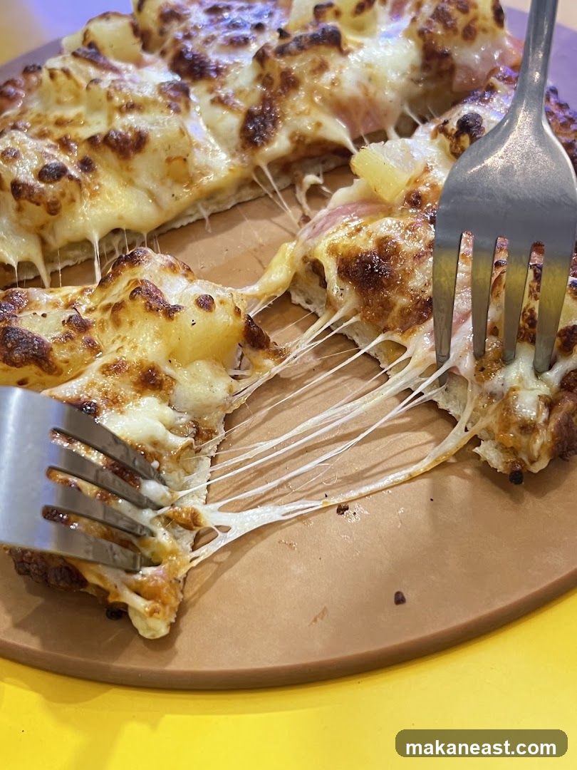 Pizza with cheese pull