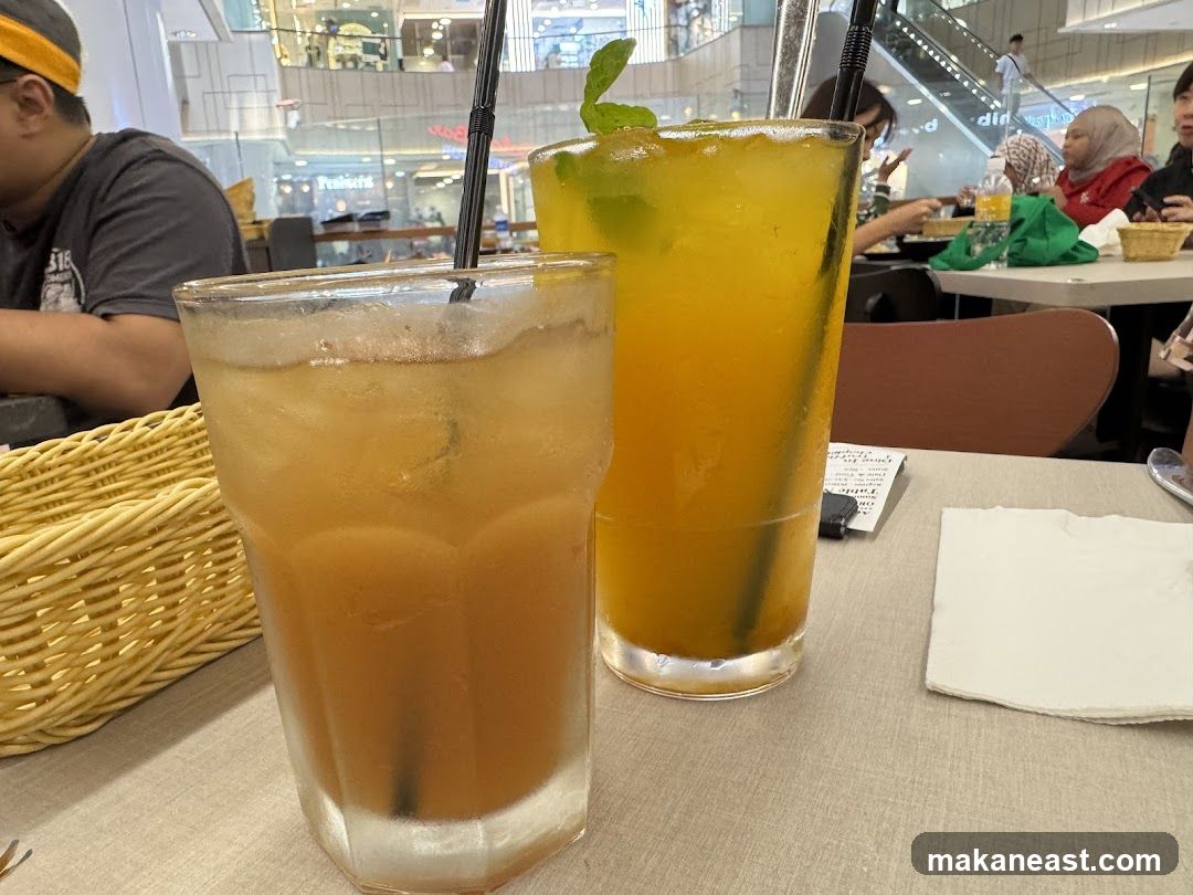 Two Iced Drinks on a Table