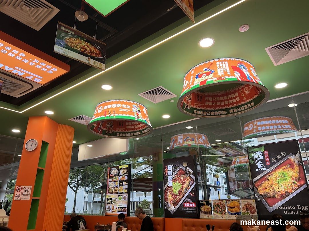 Restaurant Interior with Decorative Lamps and Food Displays