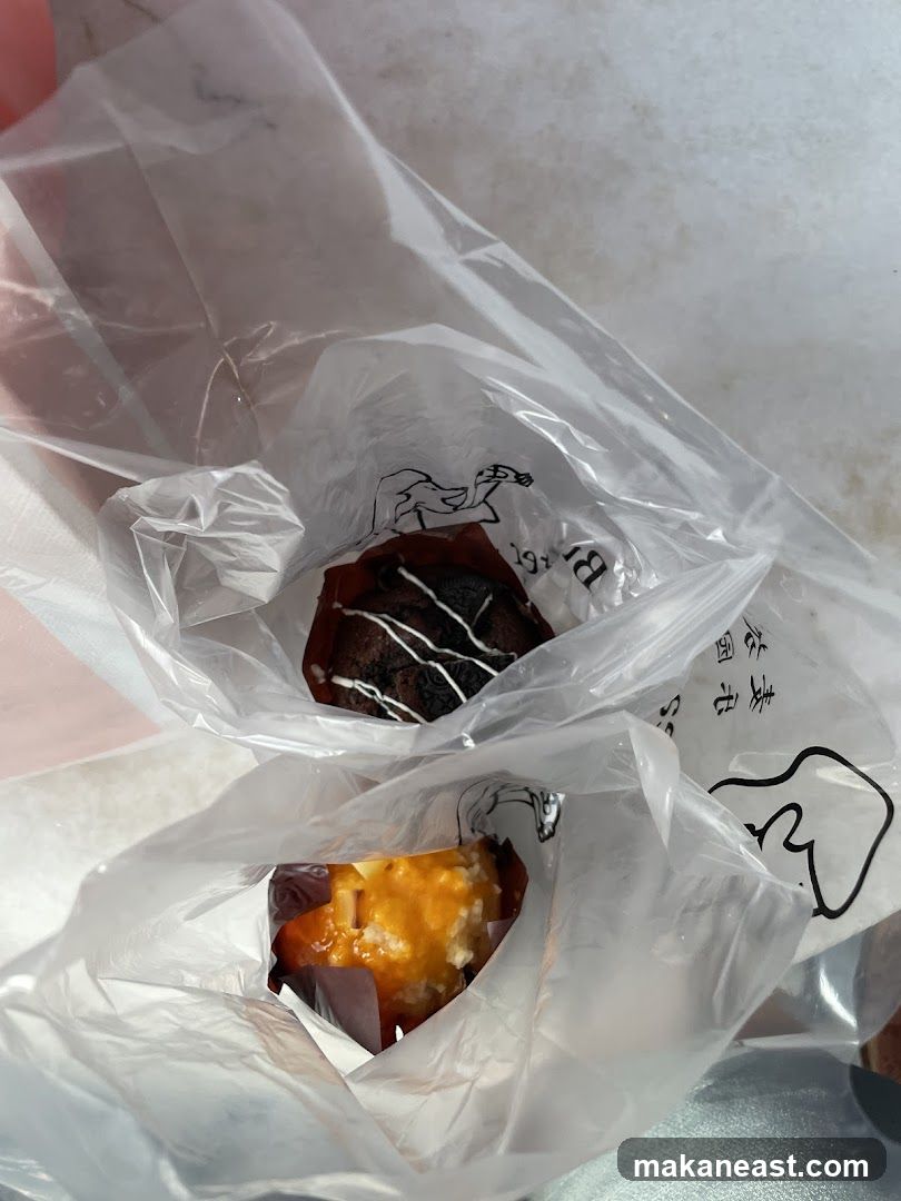 Two baked goods in plastic bags
