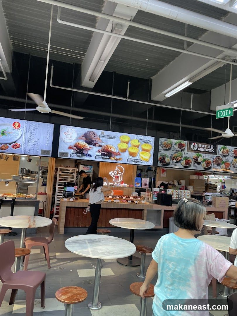 Food court with dining tables and food stalls