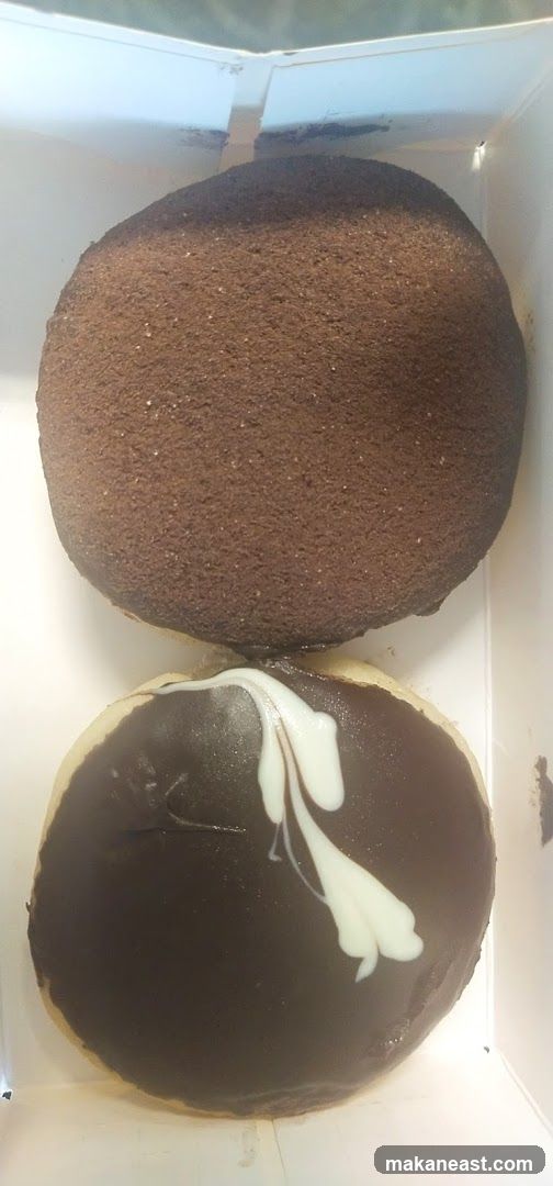 Two Chocolate Frosted Doughnuts