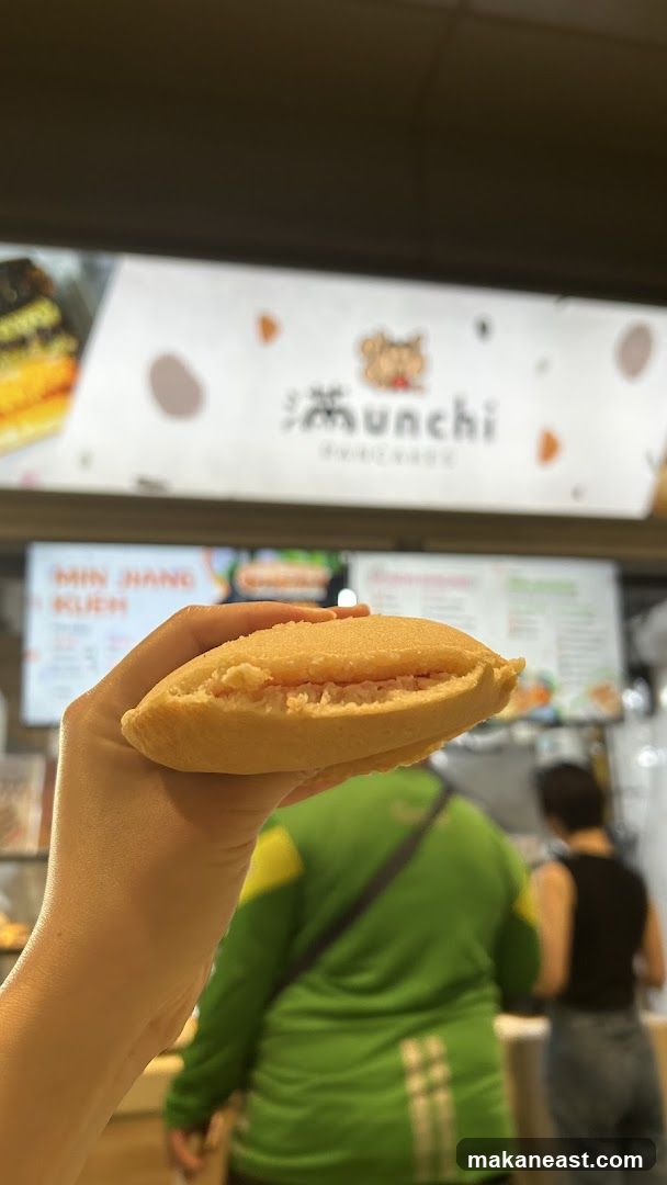 Hand holding a sweet pastry