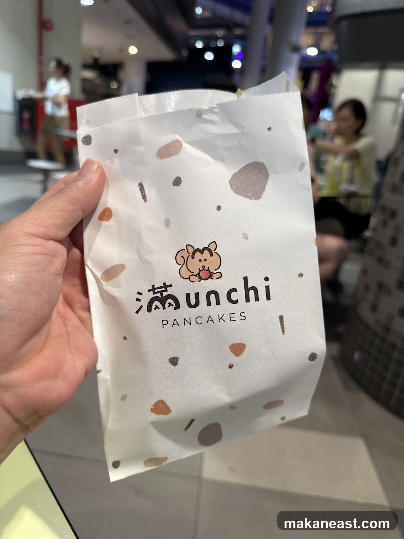 Bag with "unchi PANCAKES" logo