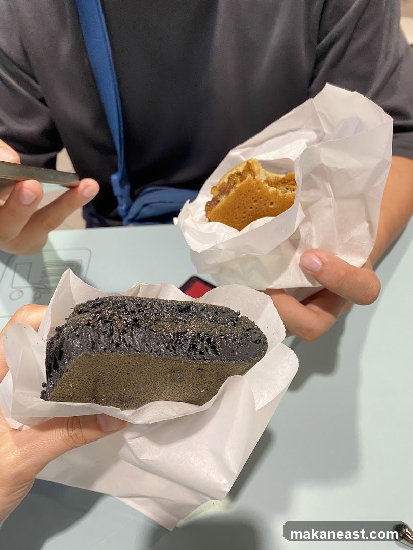 Two people holding sweet treats