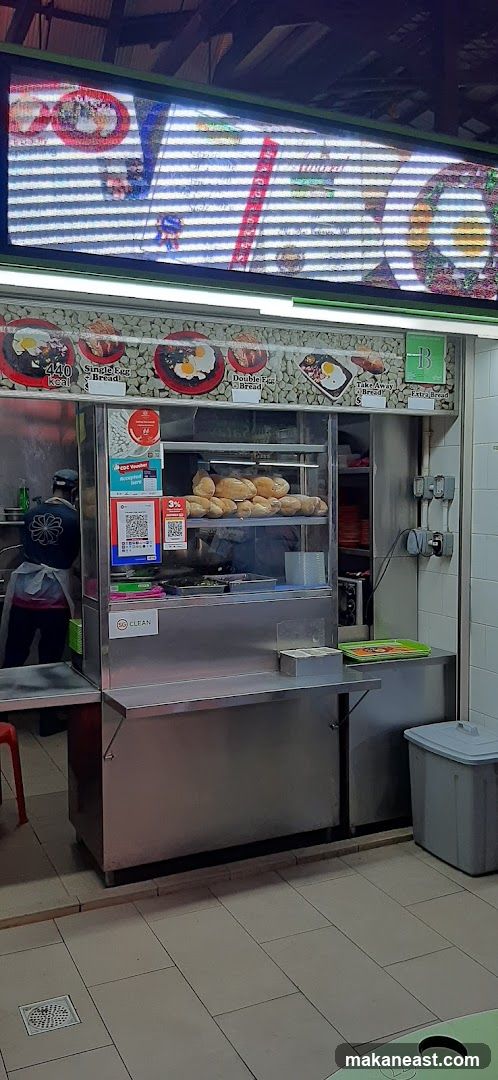 Food stall counter with bread and menu