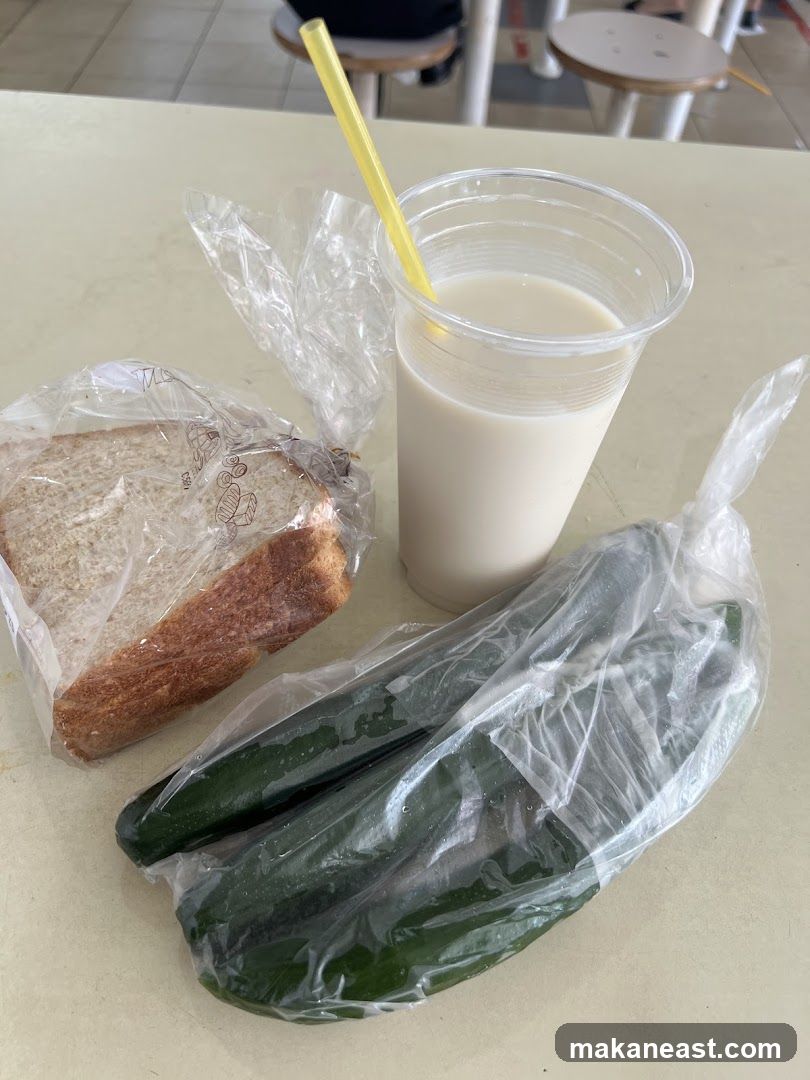 Meal with Bread, Cucumbers, and Drink