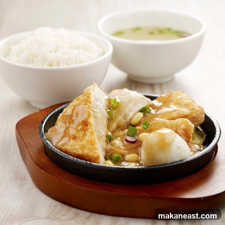 Sizzling Dish with Rice and Soup