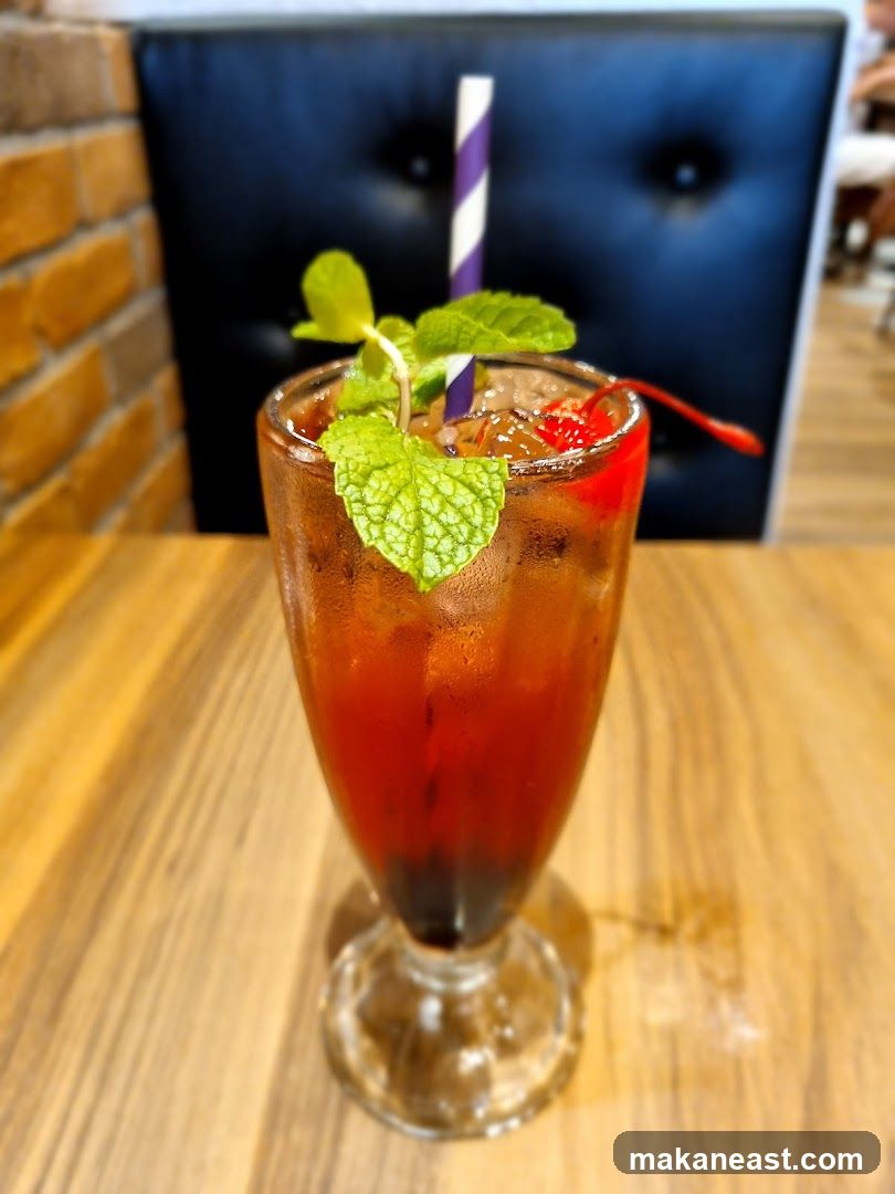 Iced Tea with Mint and Cherry