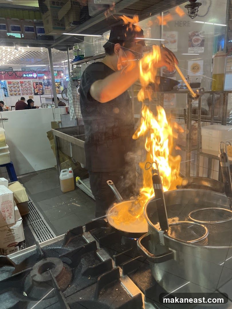 Chef cooking with flames
