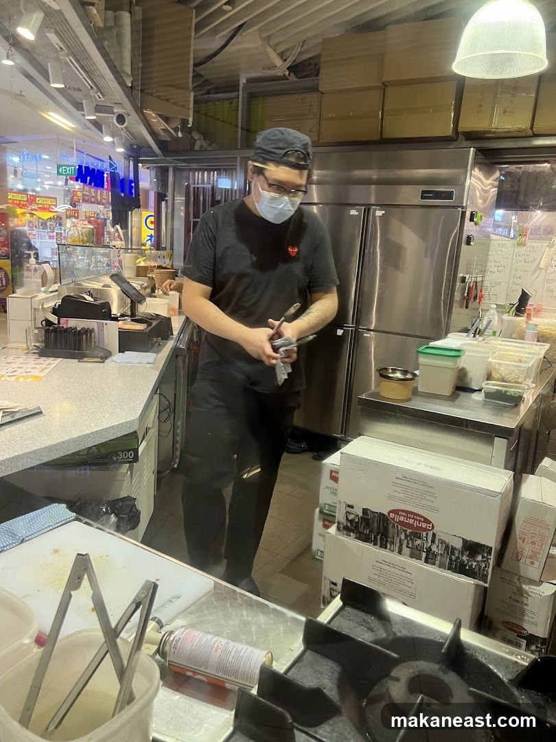 Kitchen Staff Preparing Food