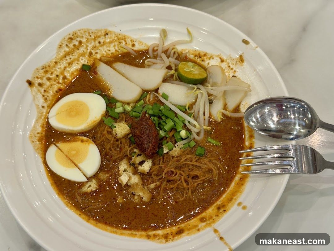 Curry Noodles with Egg and Fish Cake