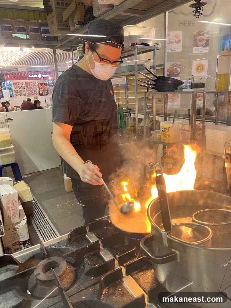 Chef cooking with flames