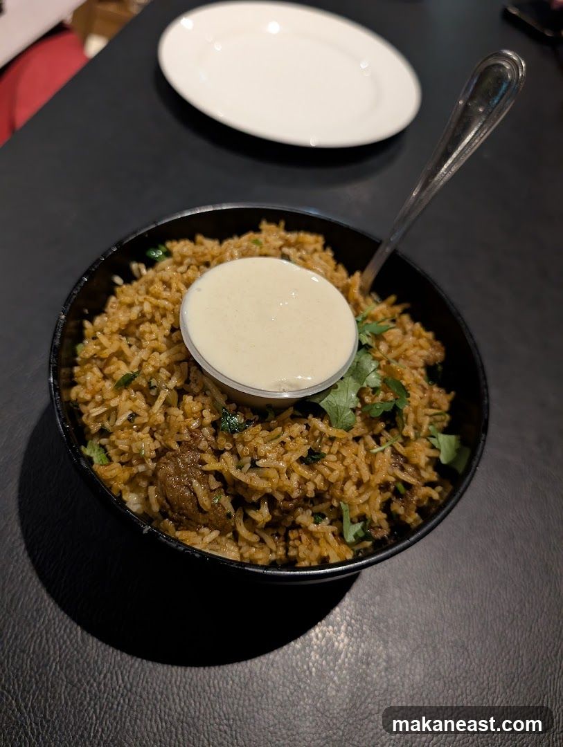 Bowl of Biryani with Sauce